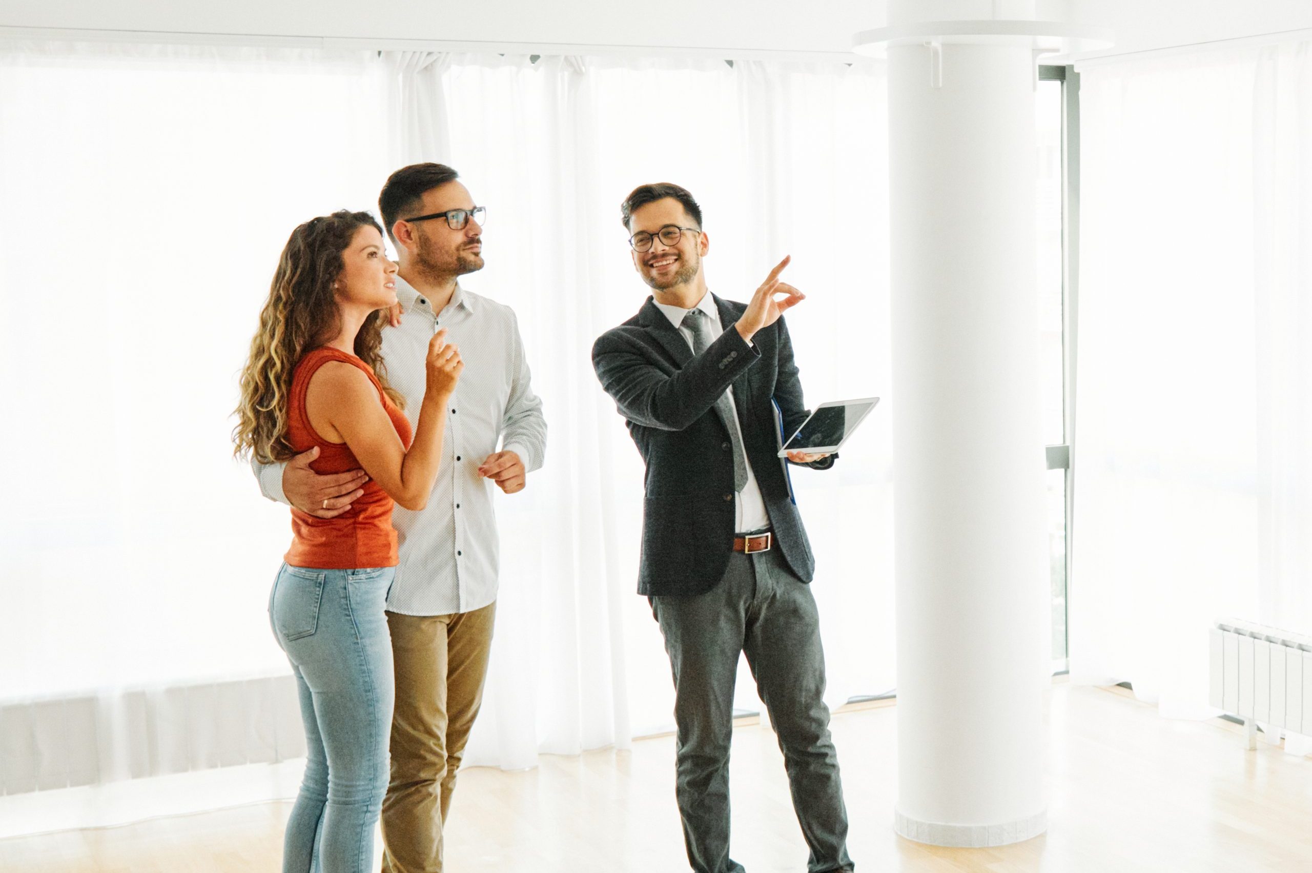 couple house property agent home real estate business buying investment apartment agreement deal client buyer new loan tablet computer technology