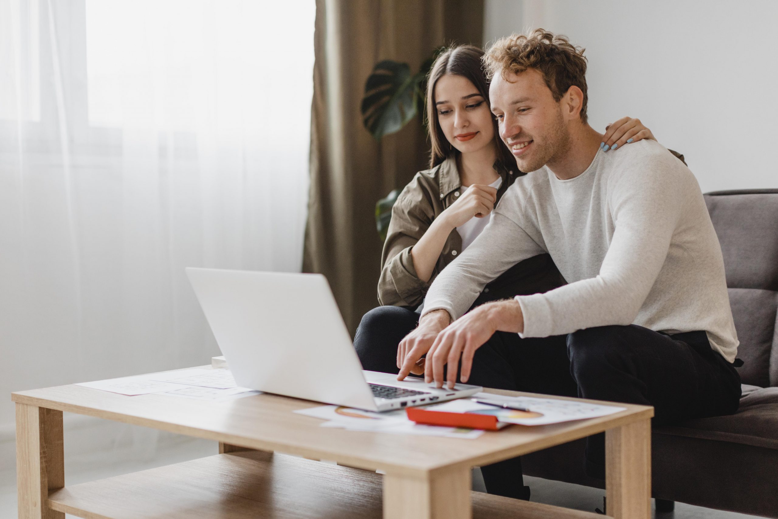 front-view-couple-making-plans-remodel-household-together